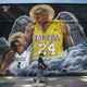A mural depicting deceased NBA star Kobe Bryant and his daughter Gianna, painted by @sloe_motions, is displayed on a building on February 13, 2020 in Los Angeles, California.